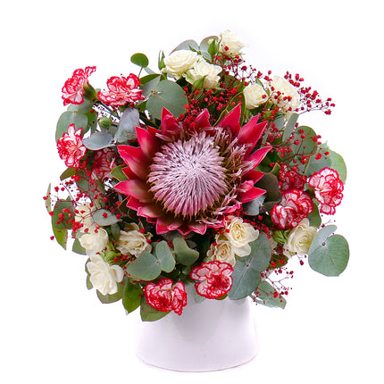 03001403_perla-cremefarbene-rosen-und-protea
