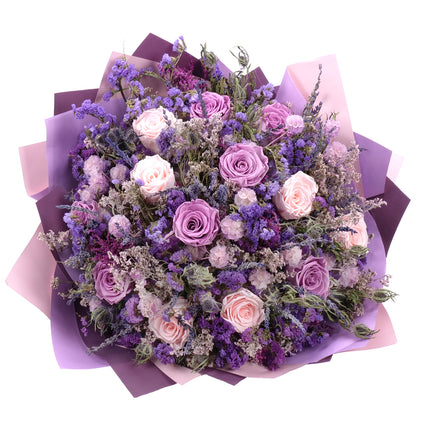 03001843_irigo-trockenstrauss-mit-violettem-strandflieder-und-praparierten-rosafarbenen-sowie-violetten-rosen