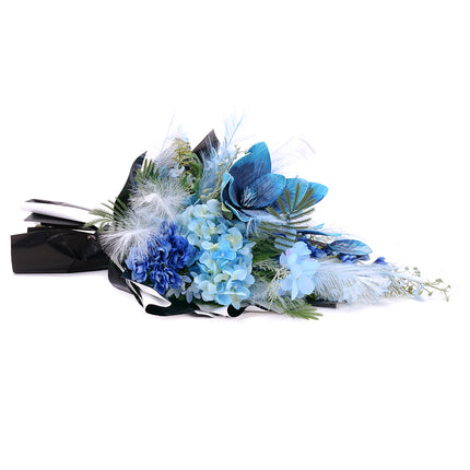 03001888_irigo-trauerstrauss-mit-blauer-magnolie-hortensie-und-rittersporn