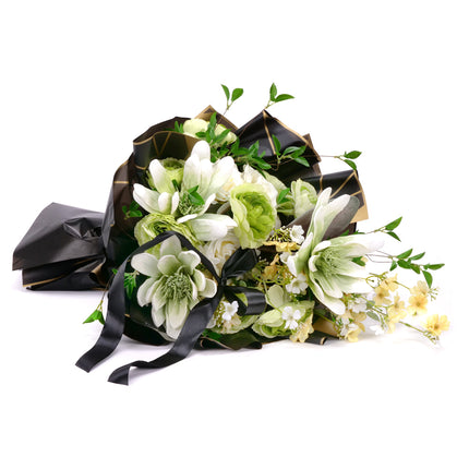 03001891_irigo-trauerstrauss-mit-gruner-magnolie-rosen-und-clematis