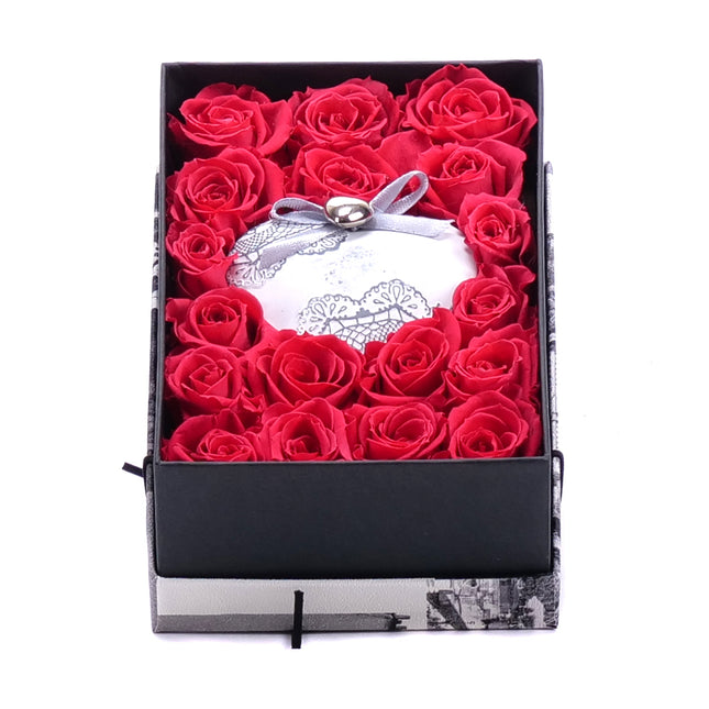 03100608_in-eterno-schwarze-box-s-mit-18-rosen-ines-pink-framboise