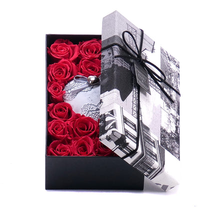 03100608_in-eterno-schwarze-box-s-mit-18-rosen-ines-pink-framboise