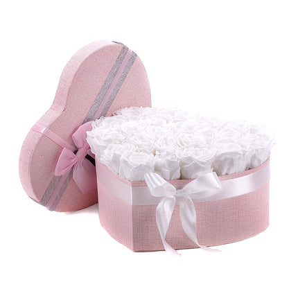03100786_in-eterno-rosa-herz-s-mit-24-rosen-princess-white