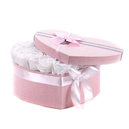 03100786_in-eterno-rosa-herz-s-mit-24-rosen-princess-white