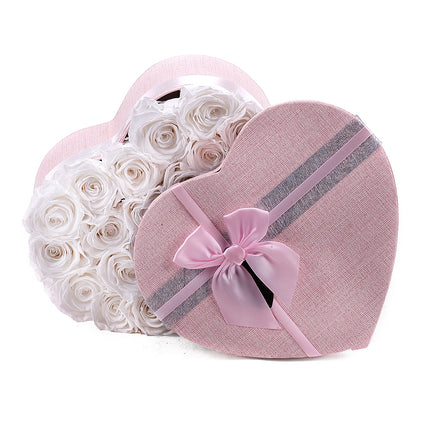 03100786_in-eterno-rosa-herz-s-mit-24-rosen-princess-white