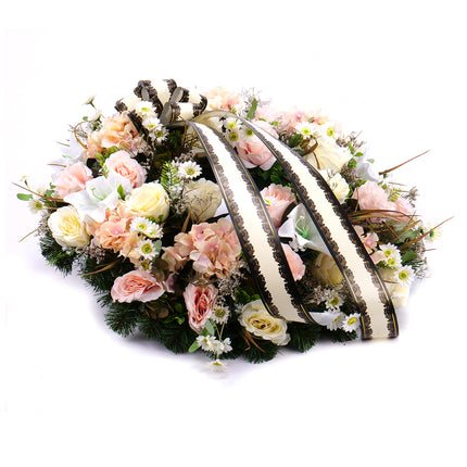 03101101_irigo-trauerkranz-mit-apricotfarbenen-und-cremefarbenen-blumen