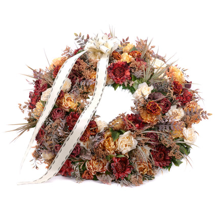 03101524_irigo-trauerkranz-mit-braunen-und-cremefarbenen-blumen