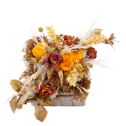 03101532_irigo-quadratische-holzbox-mit-praparierten-gelben-rosen-und-braunen-blumen