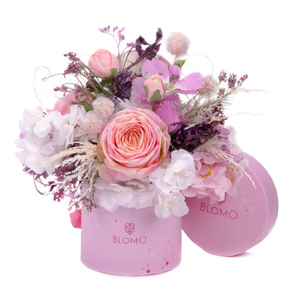 03101552_irigo-rosafarbene-blomo-box-s-mit-rosafarbenen-violetten-und-weissen-blumen