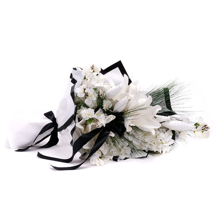 80000168_irigo-trauerstrauss-mit-weisser-magnolie-hortensie-und-orchidee